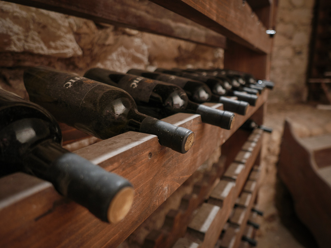 Close-up of bottles in a wine cellar